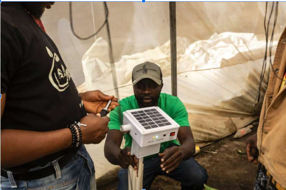 AI agents helping Nigerian farmers increase yields through smart soil monitoring AI agent analysing soil data from IoT sensor in a Nigerian greenhouse to improve crop yield