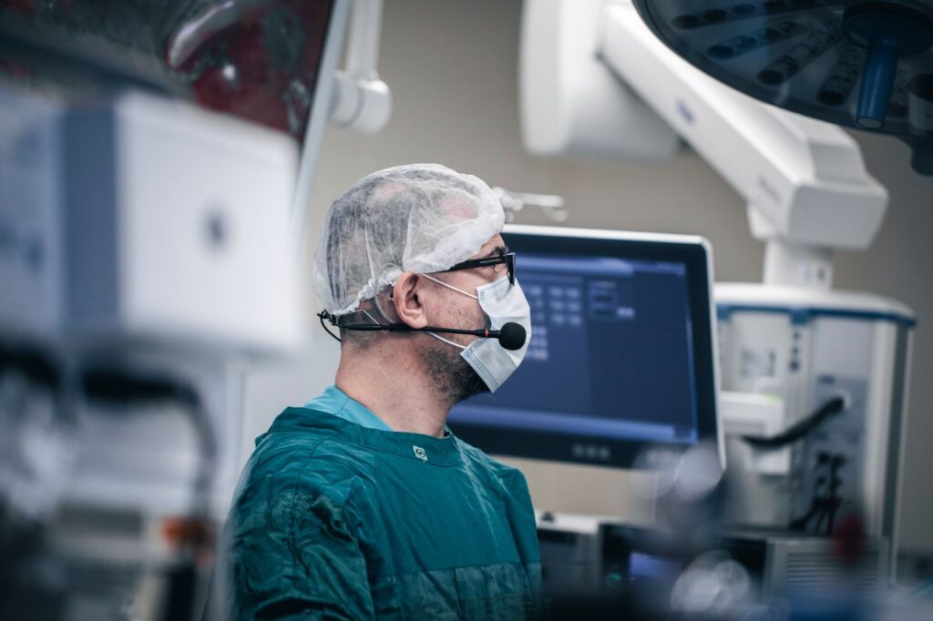 Surgeon in advanced operating room with surgical equipment in Baku, Azerbaijan.