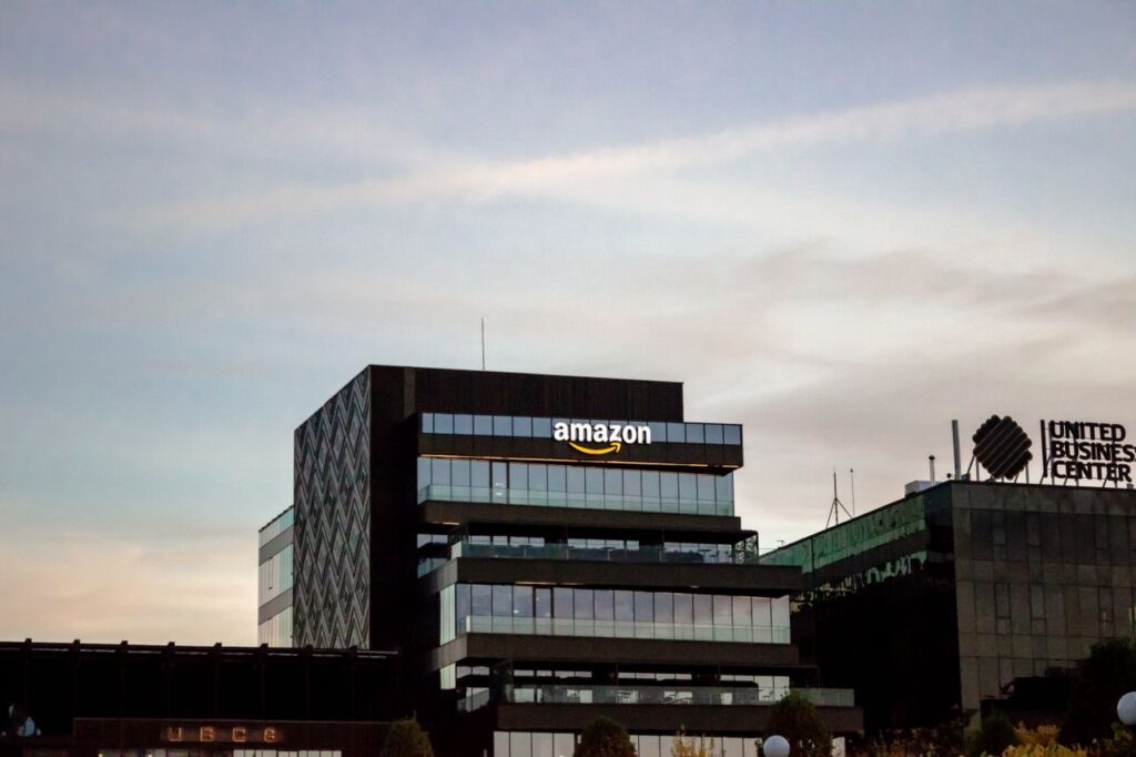 Contemporary architecture showcasing Amazon office at dusk in Iași, Romania.