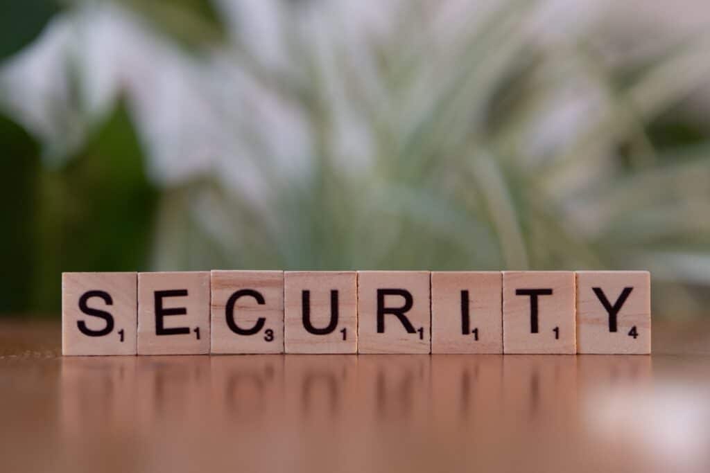 Close-up of wooden Scrabble tiles spelling SECURITY, symbolizing cybersecurity and protection.